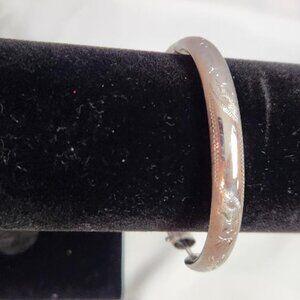 Silver toned Bangle bracelet with etching